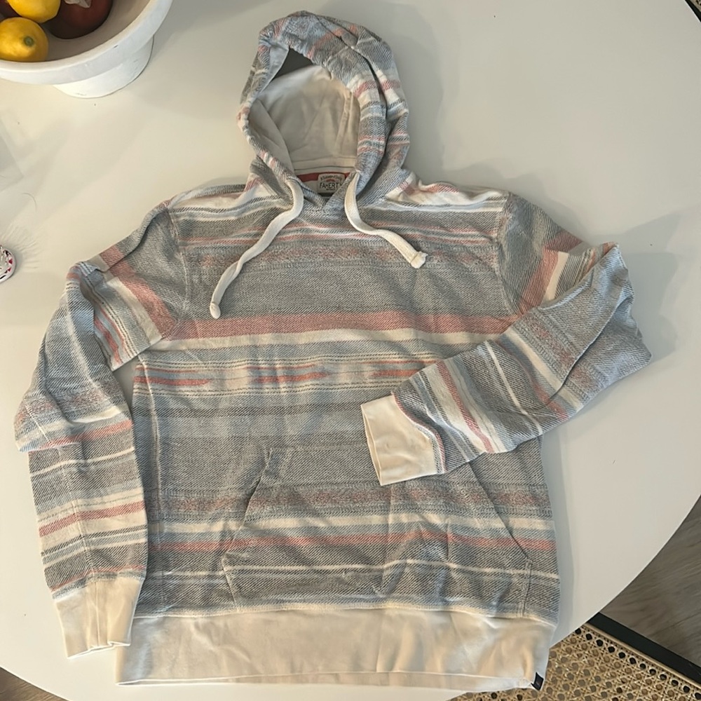 Fahery brand pull over sweatshirt.